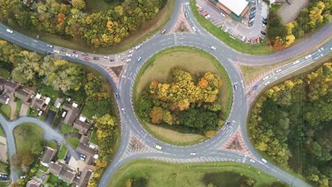 high angle rotation above urban grass roundabout junction traffic