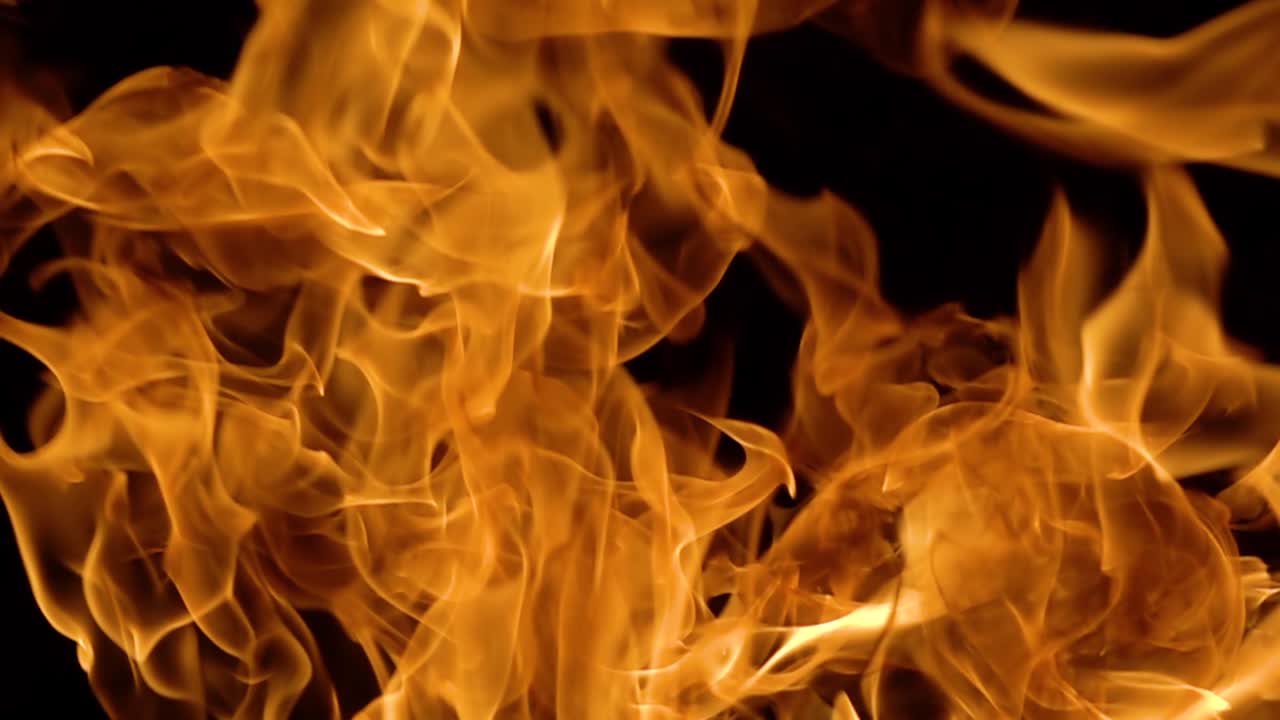 Flames of fire on black background in slow motion