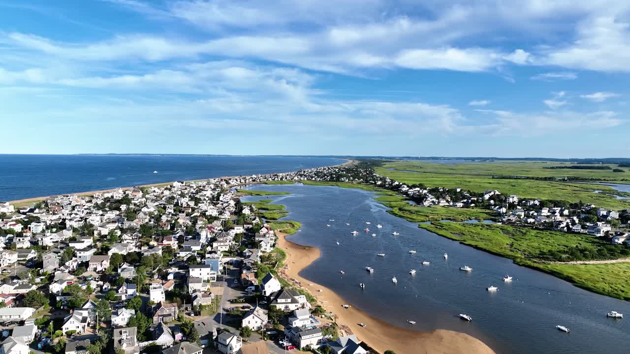 Aerial view of a coastal town in Massachusetts with beautiful beach homes