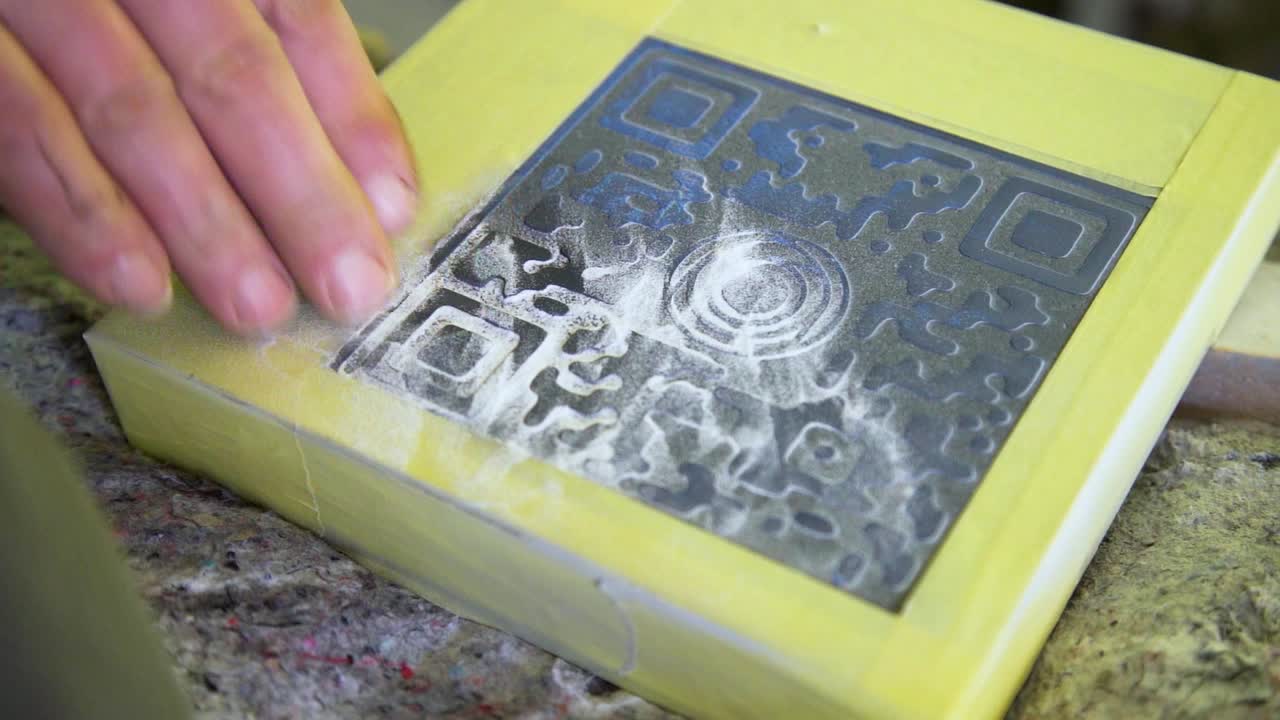 America, Europe stonemason slow motion engraving QR code for gravestone