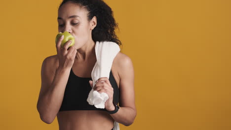 African-american-woman-over-yellow-background.