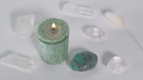 heart chakra candle with emerald and clear quartz