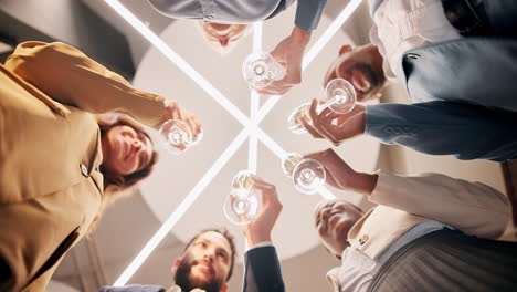 people celebrating success with a toast