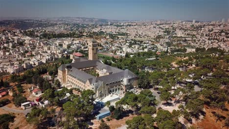 flying over augusta victoria hospital and east jerusalem