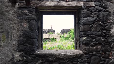 ruined building with vineyard view