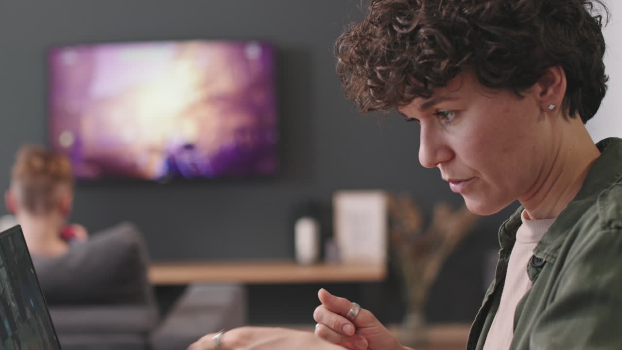 Woman Video Calling With Colleagues From Home