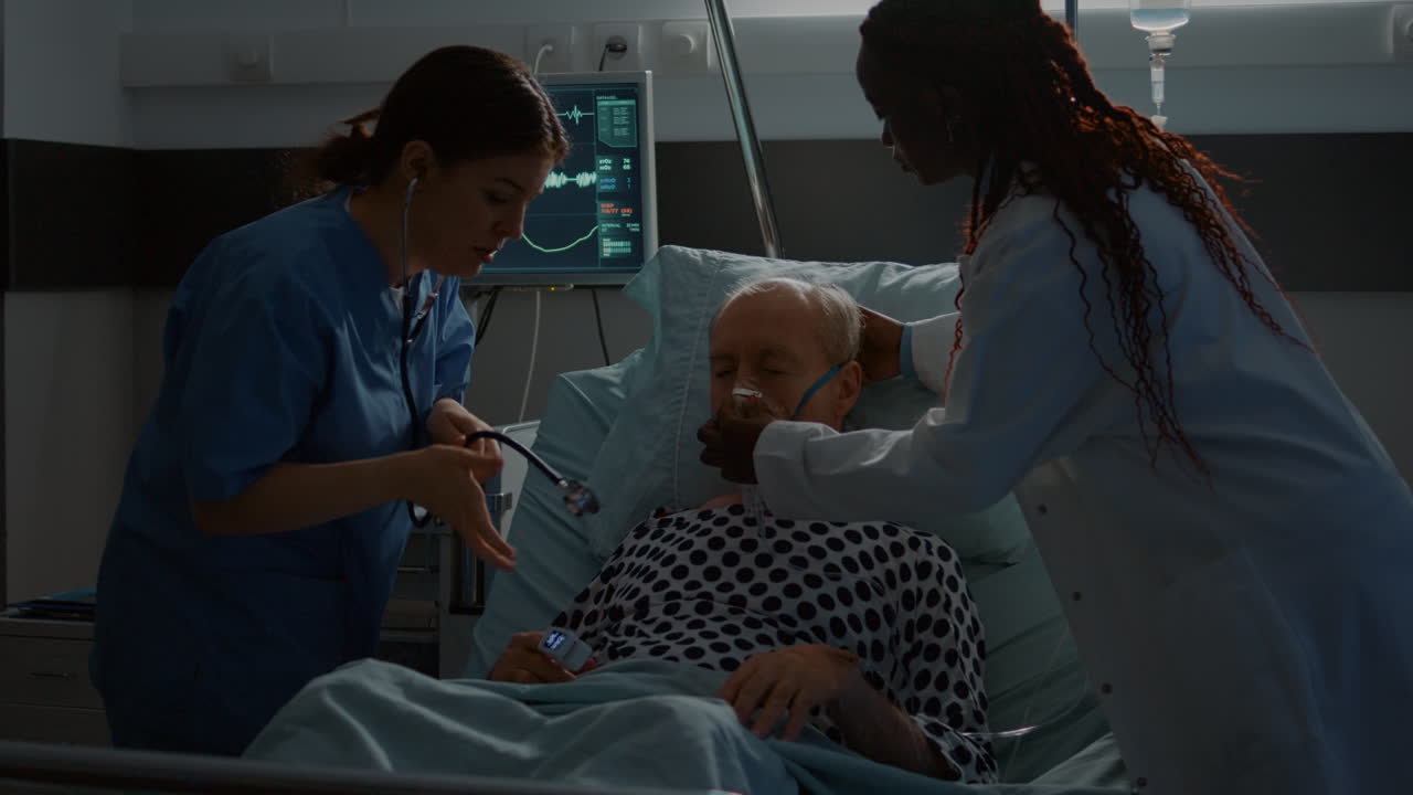 African american doctor placing oxygen tube on patient