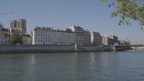 quais de seine in paris france including rebuilding work taking place on notre dame cathedral