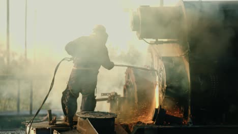 construction torcher cutting through metal pieces