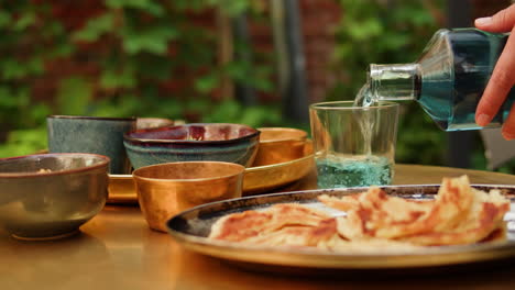 outdoor meal with drinks and roti