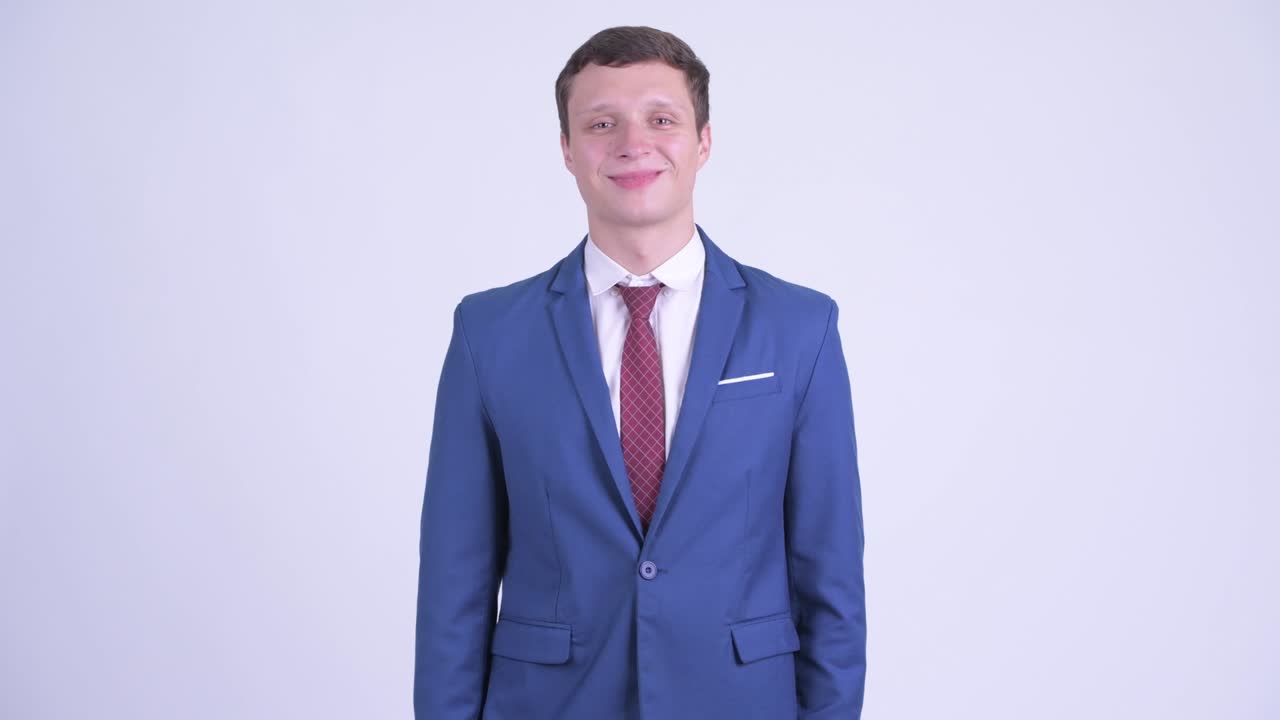 행복한 젊은 잘생긴 사업가