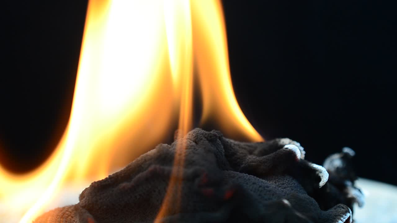 Shooting of the burning fabric. Fabric burns