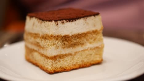 close up of a slice of tiramisu