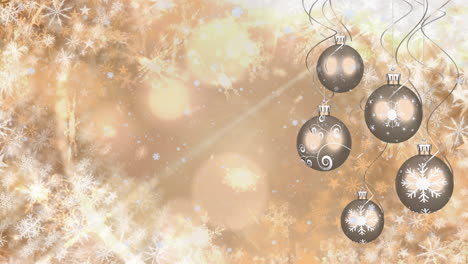 animación de la nieve cayendo sobre las bolas de navidad