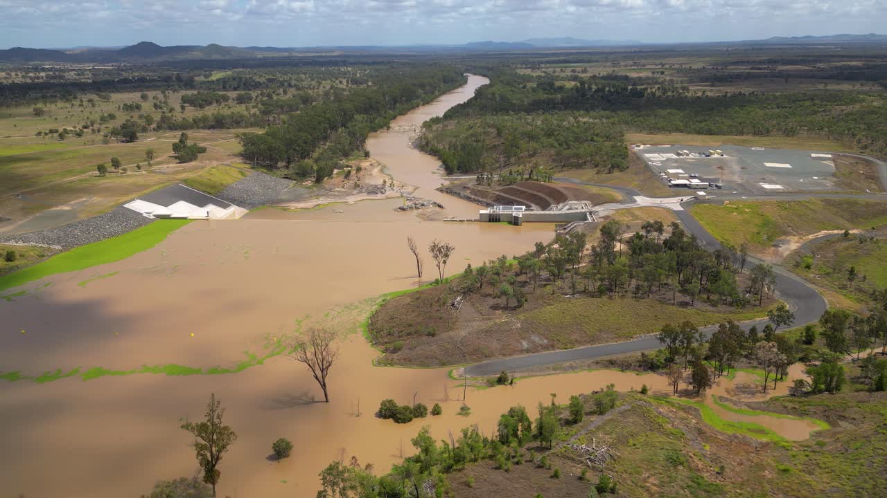 Right to left aerial views over Rookwood Weir and the Fitzroy River, West of Rockhampton, Central Queensland, Australia.