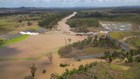 right to left aerial views over rookwood weir and the fitzroy river, west of rockhampton, central queensland, australia.
