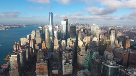 A-high-flying,-4K-drone-shot-over-lower-Manhattan,-New-York-City,-including-the-Freedom-tower-and-the-World-Trade-Center