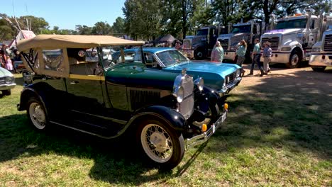 vintage cars displayed at an outdoor event