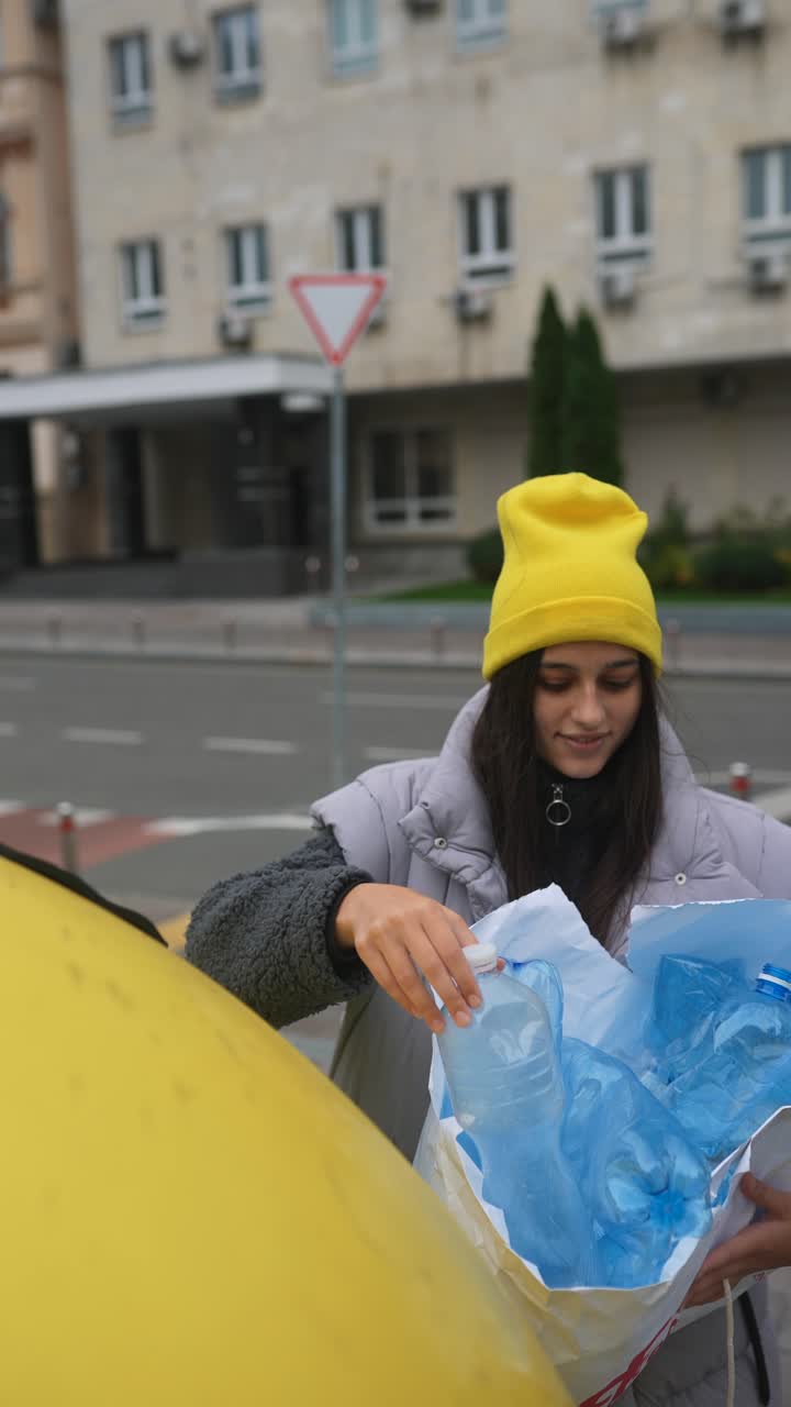 Woman Recycling Plastic Bottles