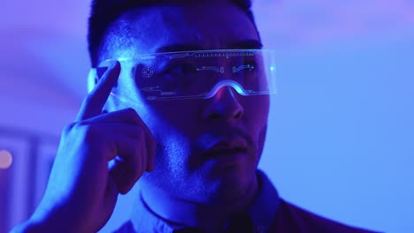man wearing futuristic augmented reality glasses
