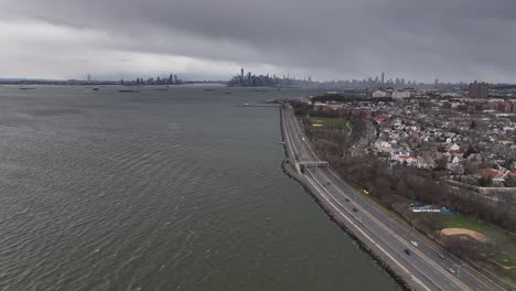 an aerial view high over the waters of upper bay in brooklyn ny