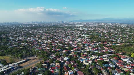 Picturesque-aerial-dolly-of-densely-populated-rural-communities-and-towns-in-Alabang-City,-Philippines