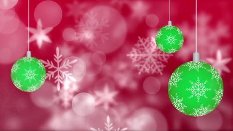 animación de la nieve cayendo sobre las bolas de navidad