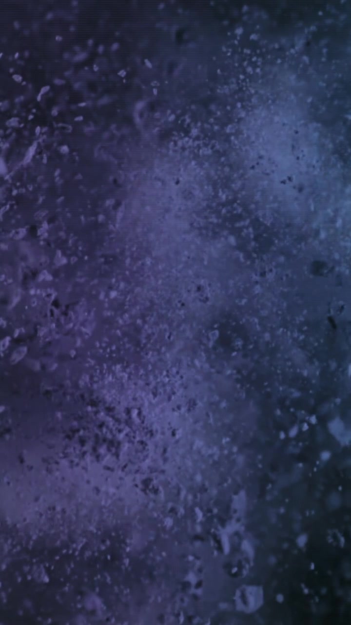 Dark Abstract Background with Floating Purple and Blue Particles