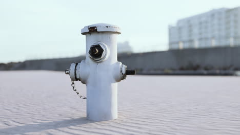 old hydrant on a seaside promenade