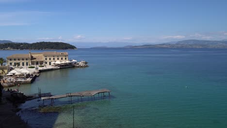 sunbathing and dinning at the picturesque faliraki, kerkyra town, corfu