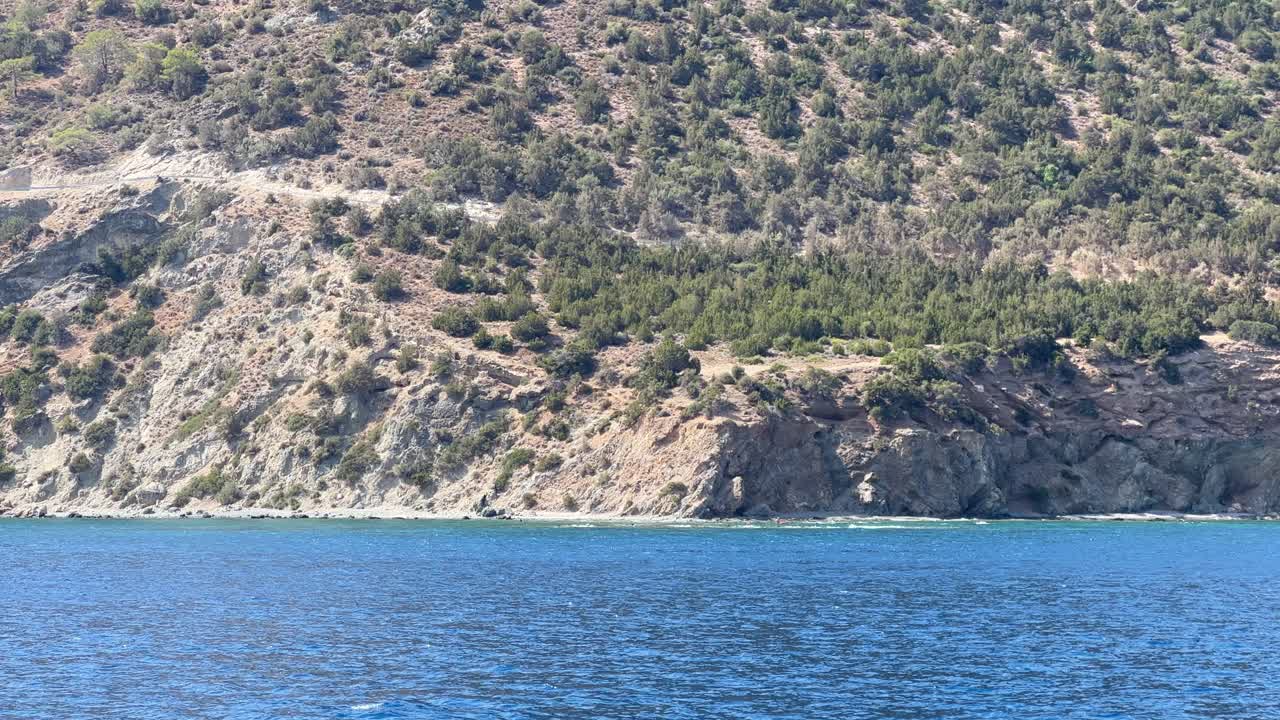 Mediterranean sea in Paphos filmed from boat, up-close establish shot