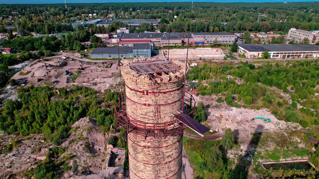 Exploring the abandoned ruins of an old tower in Latvia's landscape