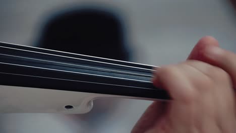 violinist plays the violin closeup