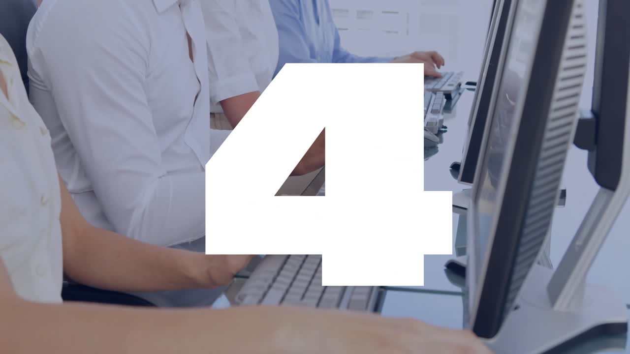 Number 5 animation over people typing on keyboards in office