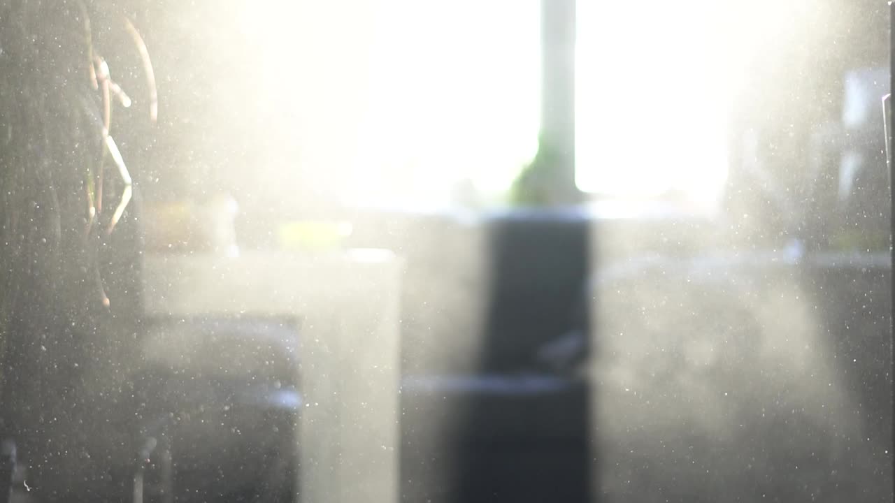 A dust flying in the air of a small flat