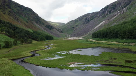 aerial shot of glendalough upper lake in wicklow mountains national park in ireland