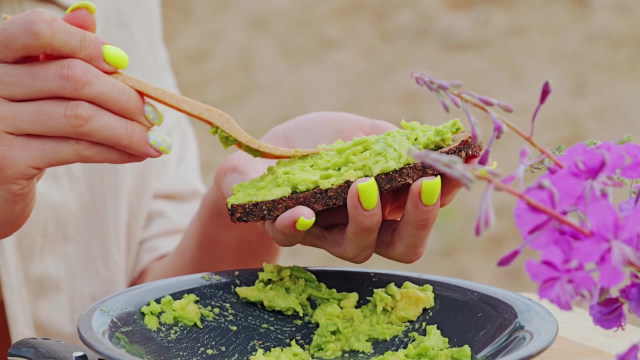 Slow motion outdoor food scene highlights healthy lifestyle and eco tableware
