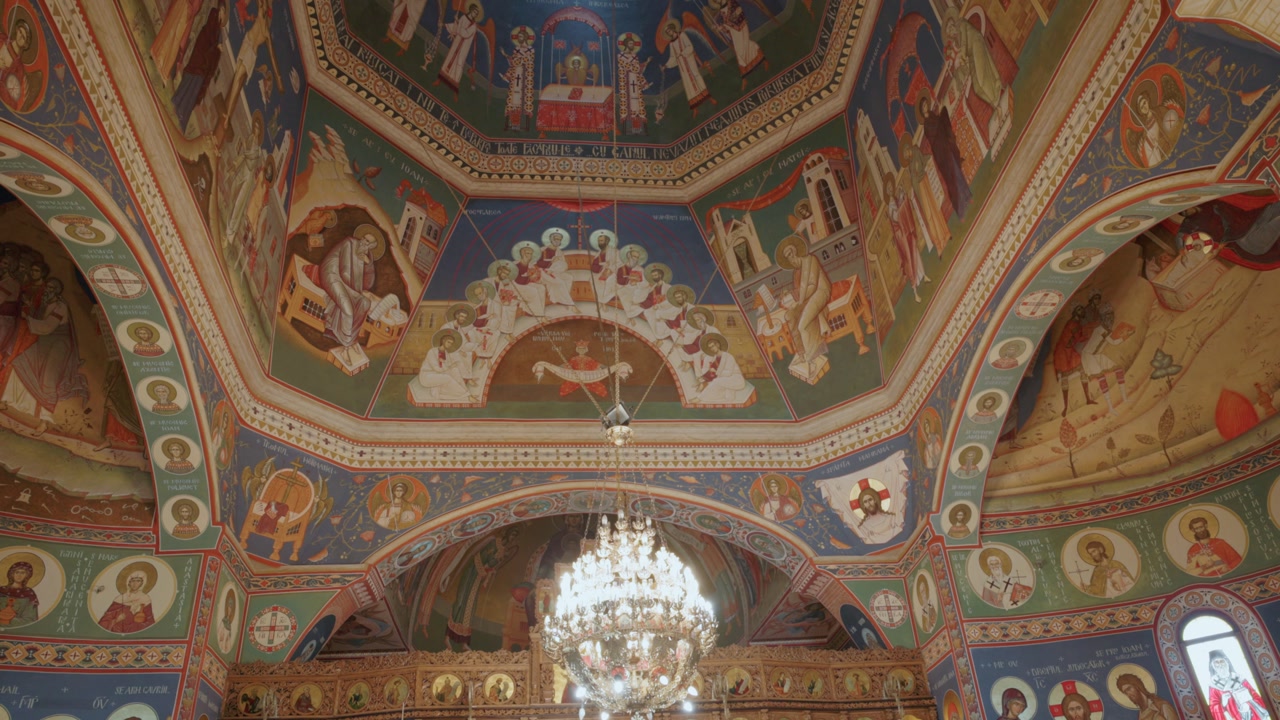 Ornate Interior With Ceiling Frescoes Of An Eastern Orthodox Church. Low Angle Shot