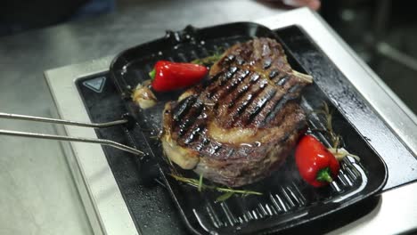 cooking a rib eye steak