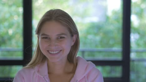 beautiful blonde women smiling at the camera