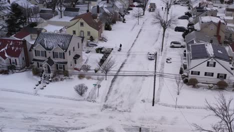 An-aerial-view-of-a-quiet,-suburban-neighborhood-after-a-nor'easter-storm