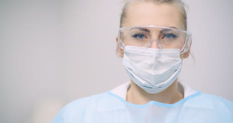 doctor measuring patient temperature at health care clinic 2