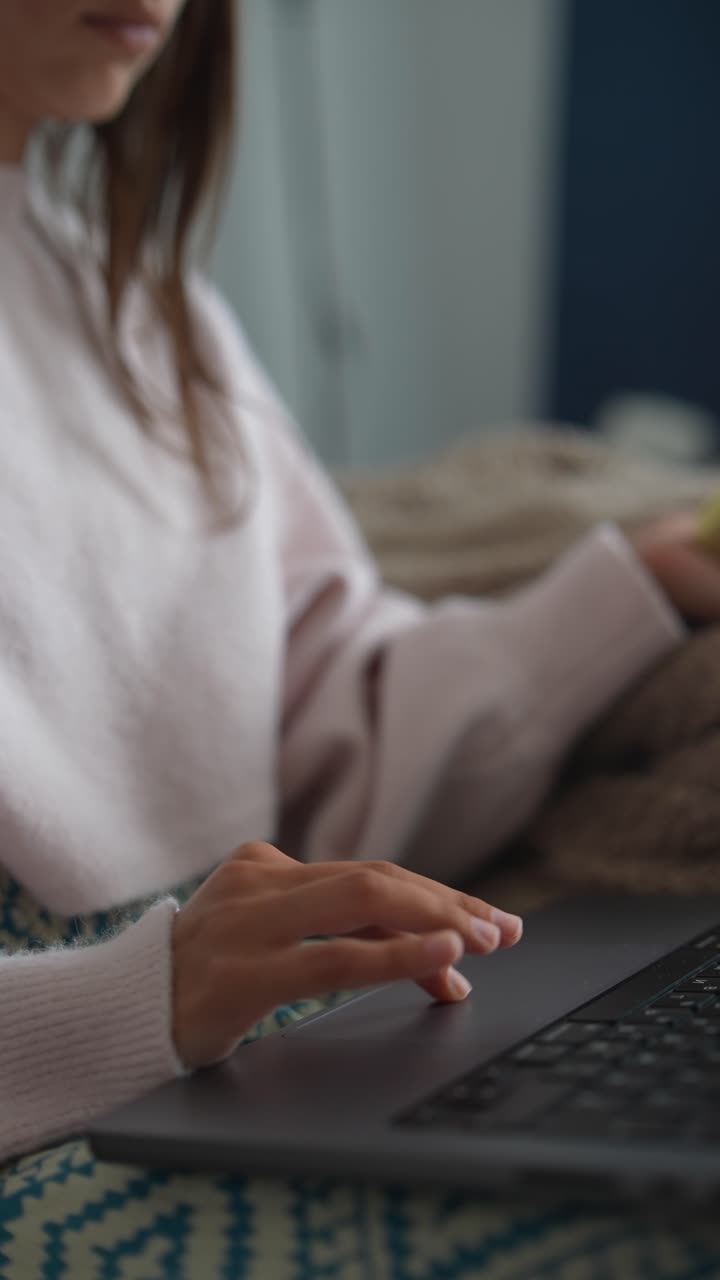 Close Up of Woman's Hands Working on Laptop Trackpad