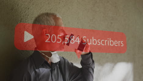 animation of subscribers text over senior man wearing face mask