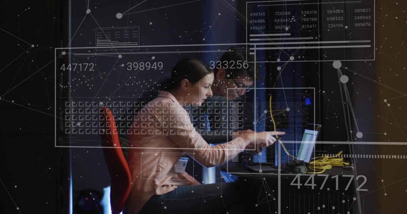 Man leaning in and pointing at laptop, woman typing and touching screen, troubleshooting network