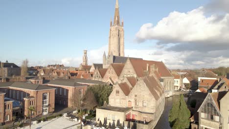 Medium-Drone-Aerial-shot-of-Our-Lady-Church-onze-lieve-vrouw-Bruges-Belgium