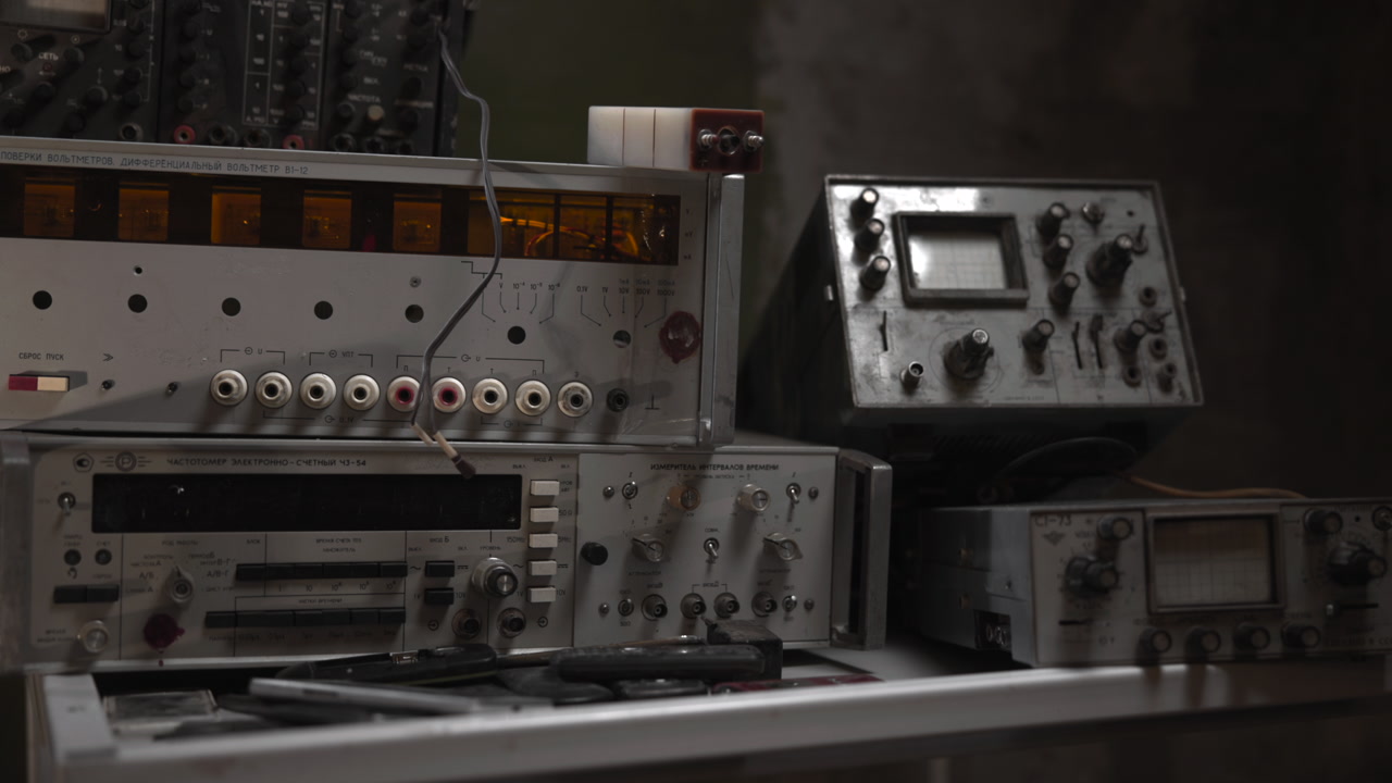 Vintage Analog Test Bench Displaying Oscilloscope Connectors And Meters In Dim Workshop, Closeup On Patch . Media