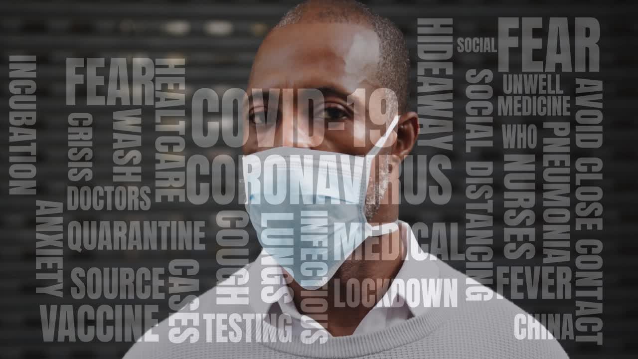 Animation of covid 19 text over african american man wearing face mask