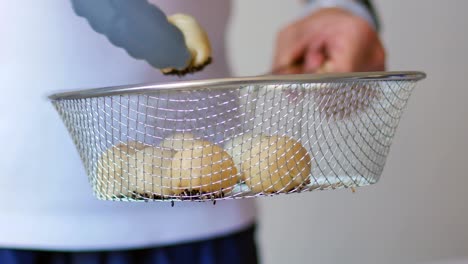 preparation of puff pastry dough for the fried chinese pastry.