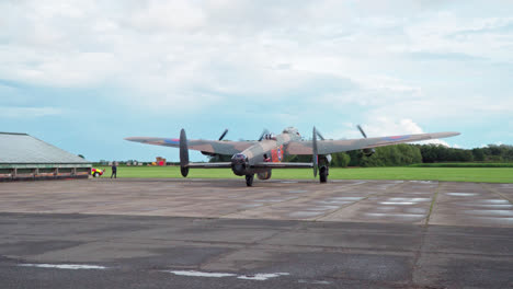 video of the famous second world war lincoln bomber airplane taxing along on a raf air-force base in lincolnshire uk